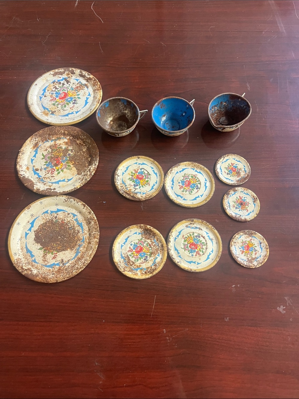 Vintage lot of Ohio Art Irwin Tin Litho Tea cups, saucers, and plates 13 pieces